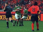 2 September 2000; Jason McAteer of Republic of Ireland is congratulated by Ian Harte and Kevin Kilbane after scoring a goal for his side during the World Cup Internaltional Championship Qualifing match between Holland and the Republic of Ireland at Amsterdam Arena in Amsterdam, Holland. Photo by David Maher/Sportsfile