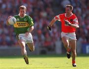 2 September 2000; Mike Hassett of Kerry in action against Andrew McCann of Armagh during the Bank of Ireland All-Ireland Senior Football Championship Semi-Final Replay match between Kerry and Armagh at Croke Park in Dublin. Photo by Brendan Moran/Sportsfile