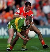 2 September 2000; Mike Hassett of Kerry in action against Steven McDonnell, of Armagh during the Bank of Ireland All-Ireland Senior Football Championship Semi-Final Replay match between Kerry and Armagh at Croke Park in Dublin. Photo by Brendan Moran/Sportsfile