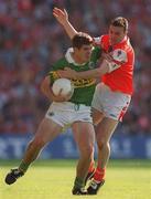2 September 2000; Eamon Fitzmaurice of Kerry in action against Oisin McConville of Armagh during the Bank of Ireland All-Ireland Senior Football Championship Semi-Final Replay match between Kerry and Armagh at Croke Park in Dublin. Photo by Brendan Moran/Sportsfile