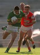 2 September 2000; Aodhan MacGearailt of Kerry in action against Kieran mcGeeney of Armagh during the Bank of Ireland All-Ireland Senior Football Championship Semi-Final Replay match between Kerry and Armagh at Croke Park in Dublin. Photo by Brendan Moran/Sportsfile