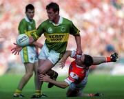 2 September 2000; Dara O'Cinneide of Kerry in action against Kieran McGeeney of Armagh during the Bank of Ireland All-Ireland Senior Football Championship Semi-Final Replay match between Kerry and Armagh at Croke Park in Dublin. Photo by Brendan Moran/Sportsfile
