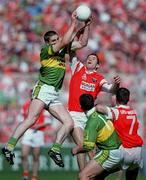 2 September 2000; Darragh O'Se of Kerry in action against Paul McGraine of Armagh during the Bank of Ireland All-Ireland Senior Football Championship Semi-Final Replay match between Kerry and Armagh at Croke Park in Dublin. Photo by Brendan Moran/Sportsfile