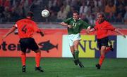 2 September 2000; Kevin Kilbane of Republic of Ireland in action against Frank de Boer, 4, and Paul Bosvelt of Holland during the World Cup Internaltional Championship Qualifing match between Holland and the Republic of Ireland at Amsterdam Arena in Amsterdam, Holland. Photo by David Maher/Sportsfile