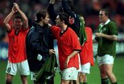 2 September 2000; Republic of Ireland's goal scorers Jason McAteer and Robbie Keane celebrate following the  World Cup Internaltional Championship Qualifing match between Holland and the Republic of Ireland at Amsterdam Arena in Amsterdam, Holland. Photo by David Maher/Sportsfile