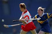 3 September 2000; Linda Mellerick of Cork in action against Philly Fogarty of Tipperary during the All-Ireland Senior Camogie Championship Final match between Tipperary and Cork at Croke Park in Dublin. Photo by Pat Murphy/Sportsfile