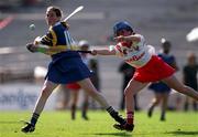 3 September 2000; Philly Fogarty of Tipperary in action against Vivienne Harris of Cork during the All-Ireland Senior Camogie Championship Final match between Tipperary and Cork at Croke Park in Dublin. Photo by Pat Murphy/Sportsfile