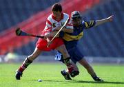 3 September 2000; Mags Finn of Cork in action against Caitriona Hennessy of Tipperary during the All-Ireland Senior Camogie Championship Final match between Tipperary and Cork at Croke Park in Dublin. Photo by Pat Murphy/Sportsfile