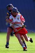 3 September 2000; Sinead O'Callaghan of Cork in action against Ciara Gaynor of Tipperary during the All-Ireland Senior Camogie Championship Final match between Tipperary and Cork at Croke Park in Dublin. Photo by Pat Murphy/Sportsfile