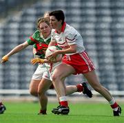 2 September 2000; Lisa McGirr of Tyrone in action against Marthe O'Mally of Mayo during the All-Ireland Ladies Senior Football Championship Semi-final match between Mayo and Tyrone at Croke Park in Dublin. Photo by Brendan Moran/Sportsfile
