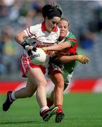 2 September 2000; Eilis Gormley of Tyrone, is tackled by Niamh Lally of Mayo during the All-Ireland Ladies Senior Football Championship Semi-final match between Mayo and Tyrone at Croke Park in Dublin. Photo by Brendan Moran/Sportsfile