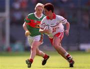 2 September 2000; Claire McGarvey of Tyrone in action against Marie Staunton of Mayo during the All-Ireland Ladies Senior Football Championship Semi-final match between Mayo and Tyrone at Croke Park in Dublin. Photo by Brendan Moran/Sportsfile