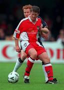 23 July 2000; Ciaran Quinn of St Patricks Athletic in action against Hayden Fox of West Ham United during the Pre-Season Friendly match between St Patrick's Athletic and West Ham United at Richmond Park in Dublin Photo by David Maher/Sportsfile