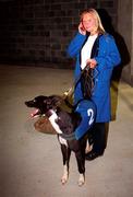 8 September 2000; Marie Clarke with Droopys Vieri, a heat winner in the DJ Reilly Millennium Puppy Derby, at Harolds Cross Greyhound racing Stadium in Dublin. Photo by Ray McManus/Sportsfile