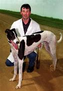 8 September 2000; Trainer Shay Fahy with Ten to Follow, a heat winner in the DJ Reilly Millennium Puppy Derby, at Harolds Cross Greyhound racing Stadium in Dublin. Photo by Ray McManus/Sportsfile