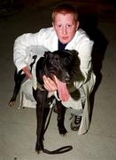 8 September 2000; Emmett Sweeney with Tuesdays Holly, a heat winner in the DJ Reilly Millennium Puppy Derby, at Harolds Cross Greyhound racing Stadium in Dublin. Photo by Ray McManus/Sportsfile