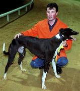 8 September 2000; Trainer Shay Fahy with Knockash Zero, a heat winner in the DJ Reilly Millennium Puppy Derby, at Harolds Cross Greyhound racing Stadium in Dublin. Photo by Ray McManus/Sportsfile
