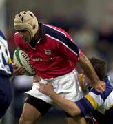 8 September 2000; Michael Mullins of Munster evades the tackle by Leinster's Peter McKenn during the Interprovincial Championship match between Munster and Leinster at Musgrave Park in Cork. Photo by Matt Browne/Sportsfile