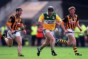 10 September 2000; Joe Errity of Offaly in action against Michael Kavanagh, left, and John Power of Kilkenny during the All-Ireland Senior Hurling Championship Final match between Kilkenny and Offaly at Croke Park in Dublin. Photo by Ray McManus/Sportsfile