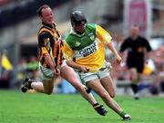 10 September 2000; Brendan Murphy of Offaly in action against Andy Comerford of Kilkenny during the All-Ireland Senior Hurling Championship Final match between Kilkenny and Offaly at Croke Park in Dublin. Photo by Ray McManus/Sportsfile