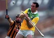 10 September 2000; Kevin Kinahan of Offaly in action against DJ Carey of Kilkenny during the All-Ireland Senior Hurling Championship Final match between Kilkenny and Offaly at Croke Park in Dublin. Photo by Ray McManus/Sportsfile
