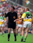 10 September 2000; John Troy of Offaly hands referee Willie Barrett the substitution slip during the All-Ireland Senior Hurling Championship Final match between Kilkenny and Offaly at Croke Park in Dublin. Photo by Aoife Rice/Sportsfile