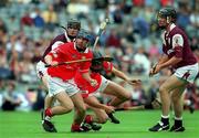 10 September 2000; Cork's Tomas O'Lerary shots to score his sides second goal during the All-Ireland Minor Hurling Championship Final match between Cork and Galway at Croke Park in Dublin. Photo by Matt Browne/Sportsfile