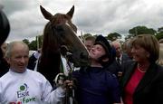9 September 2000; Mick Kinane with Giant's Causeway pictured after winning the Esat Digifone Irish Champion Stakes during horse racing from Leopardstown in Dublin. Photo by Matt Browne/Sportsfile