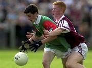 9 September 2000; Paul Prenty of Mayo is tackled by Donal O'Donoghue of Westmeath during the All-Ireland Minor Football Final Semi-Final replay match between Mayo and Westmeath in Carrick on Shannon, Leitrim. Photo by Damien Eagers / Sportsfile