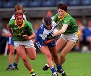 9 September 2000; Anna Lisa Crotty of Waterford is tackled by Niamh McEilis, right, and Lisa Kennan of Meath during the All-Ireland Senior Ladies Football Championship Semi- Final match between Waterford and Meath at Parnell Park in Dublin. Photo by Aoife Rice/Sportsfile