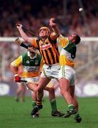 10 September 2000; Johnny Dooley of Offaly  in action against Canice Brennan of  Kilkenny during the All-Ireland Senior Hurling Championship Final match between Kilkenny and Offaly at Croke Park in Dublin. Photo by Aoife Rice/Sportsfile