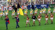 10 September 2000; Both teams parade ahead of the All-Ireland Senior Hurling Championship Final match between Kilkenny and Offaly at Croke Park in Dublin. Photo by Aoife Rice/Sportsfile