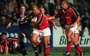 8 September 2000; Peter Clohessy of Munster is tackled by Brian O'Meara of Leinster during the Interprovincial Championship match between Munster and Leinster at Musgrave Park in Cork. Photo by Matt Browne/Sportsfile