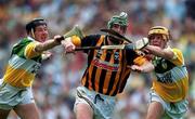 10 September 2000;  Henry Shefflin of Kilkenny breaks the challange from Offaly's Brian Whelahan, left, and Niall Claffey during the All-Ireland Senior Hurling Championship Final match between Kilkenny and Offaly at Croke Park in Dublin. Photo by Damien Eagers/Sportsfile