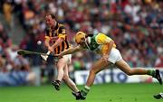 10 September 2000; Andy Comerford of Kilkenny in action against Ger Oakley of Offaly during the All-Ireland Senior Hurling Championship Final match between Kilkenny and Offaly at Croke Park in Dublin. Photo by Damien Eagers/Sportsfile