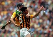 10 September 2000; Philip Larkin of Kilkenny in action against Gary Hannify of Offaly during the All-Ireland Senior Hurling Championship Final match between Kilkenny and Offaly at Croke Park in Dublin. Photo by Ray McManus/Sportsfile