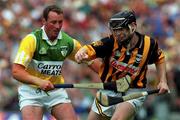 10 September 2000; Peter Barry of Kilkenny in action against John Ryan of Offaly during the All-Ireland Senior Hurling Championship Final match between Kilkenny and Offaly at Croke Park in Dublin. Photo by Ray McManus/Sportsfile