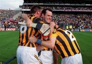 10 September 2000; Brian McEvoy of Kilkenny, centre, celebrates with Eamon Kennedy, left and Michael Kavanagh (2) after the All-Ireland Senior Hurling Championship Final match between Kilkenny and Offaly at Croke Park in Dublin. Photo by Ray McManus/Sportsfile