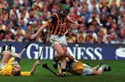 10 September 2000; Henry Shefflin of Kilkenny shoots to score his sides goal despite the efforts of Stephen Byrne, left, and Kevin Martin of Offaly during the All-Ireland Senior Hurling Championship Final match between Kilkenny and Offaly at Croke Park in Dublin. Photo by Ray McManus/Sportsfile