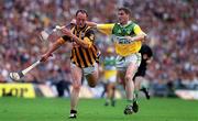 10 September 2000; Andy Comerford of Kilkenny is tackled by Michael Duignan of Offaly during the All-Ireland Senior Hurling Championship Final match between Kilkenny and Offaly at Croke Park in Dublin. Photo by Ray McManus/Sportsfile