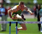 14 September 2000; Ireland's Peter Coghlan on his way to winning the Men's 110m Hurldes warm up race at the Athletics Warm-up track in Sydney Olympic Park, Homebush Bay, Sydney, Australia. Photo by Brendan Moran/Sportsfile