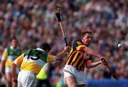 10 September 2000; Eamon Kennedy of Kilkenny in action against John Ryan of Offaly during the All-Ireland Senior Hurling Championship Final match between Kilkenny and Offaly at Croke Park in Dublin. Photo by Ray McManus/Sportsfile