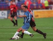 11 September 2000; Youri Djorkaeff of Kaiserslautern in action against Stephen Caffrey of Bohemians during the UEFA Cup first round, first leg, match between Bohemians and Kaiserslautern at Tolka Park in Dublin. Photo by Damien Eagers/Sportsfile
