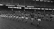 28 September 1975; The Kerry and Dublin teams parade round Croke Park prior to the All-Ireland Football Final between Kerry and Dublin. Photo by Connolly Collection/Sportsfile