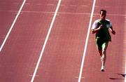 14 September 2000. Ireland's Mark Carroll has a run out on the track during a warm up meeting at the Sydney International Athletic centre. Sydney Olympic Park. Homebush Bay, Sydney in Australia. Photo by Brendan Moran/Sportsfile