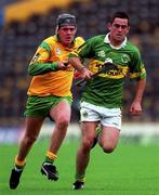 17 September 2000; Brian Donovan of Kerry in action against Tomas Lynch of Meath during the All-Ireland Minor B Hurling Championship Final match between Kerry and Meath at Semple Stadium in Thurles, Tipperary. Photo by Ray McManus/Sportsfile