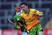 17 September 2000;  Evan Lynam of Meath in action against Padraig O'Sullivan of Kerry during the All-Ireland Minor B Hurling Championship Final match between Kerry and Meath at Semple Stadium in Thurles, Tipperary. Photo by Ray McManus/Sportsfile