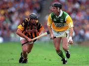 10 September 2000; Brian Whelahan of Offaly in action against John Hoyne of Kilkenny during the All-Ireland Senior Hurling Championship Final match between Kilkenny and Offaly at Croke Park in Dublin. Photo by Ray McManus/Sportsfile