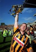 10 September 2000;  Kilkenny's Denis Byrne lifts the Liam MacCarthy Cup after the All-Ireland Senior Hurling Championship Final match between Kilkenny and Offaly at Croke Park in Dublin. Photo by Ray McManus/Sportsfile