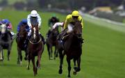 16 September 2000; Arctic Owl with David Harrison in yellow up, win's the Jefferson Smurfit Memorial Irish St. Leger, from second place Yavana's Pace with Joe Fanning up, in blue at the Curragh in Kildare. Photo by Matt Browne/Sportsfile